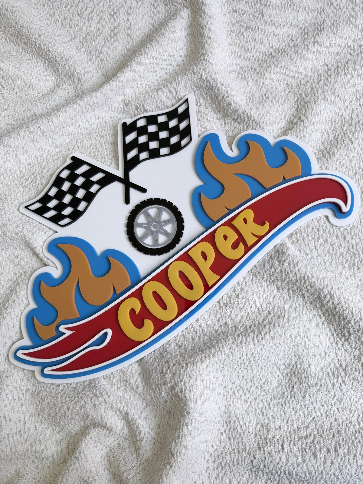 Car with flames sign